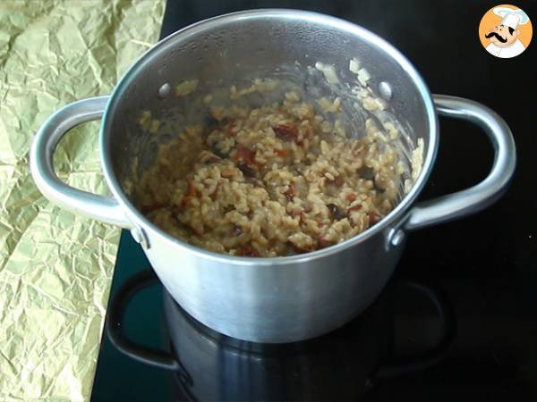 Wegetariańskie risotto z suszonymi pomidorami i pieczarkami - Przygotowanie krok 4